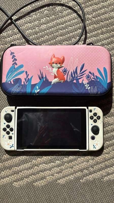 MINT Nintendo Switch with 4 games