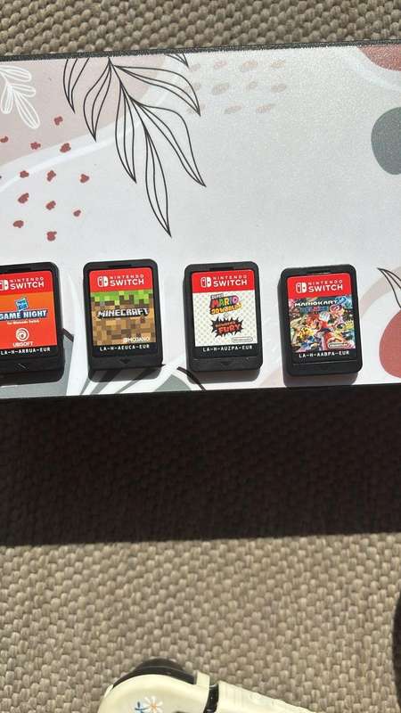 MINT Nintendo Switch with 4 games