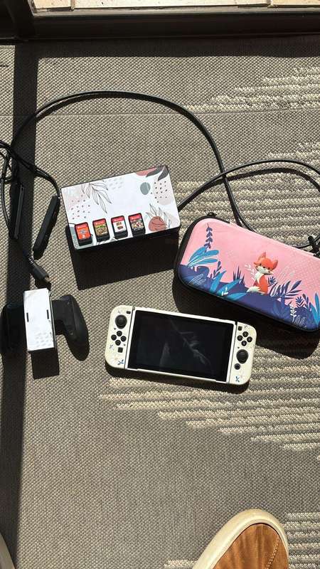 MINT Nintendo Switch with 4 games