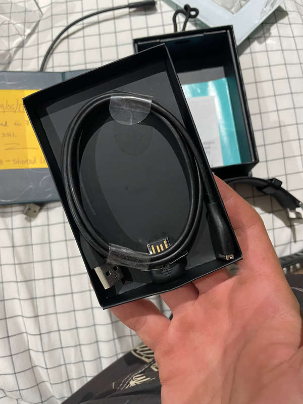 Two Fitbit Surge watches Large