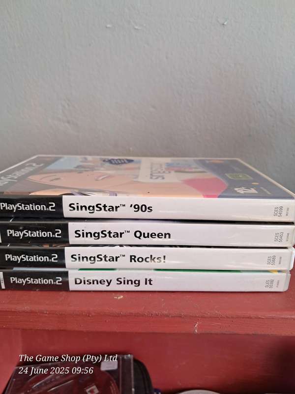 PS2 SINGSTAR BUNDLE (4X GAMES)