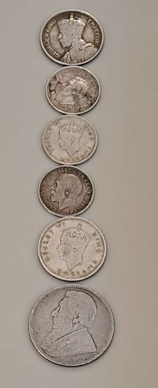 Siver coins x 6. Please see photo report.