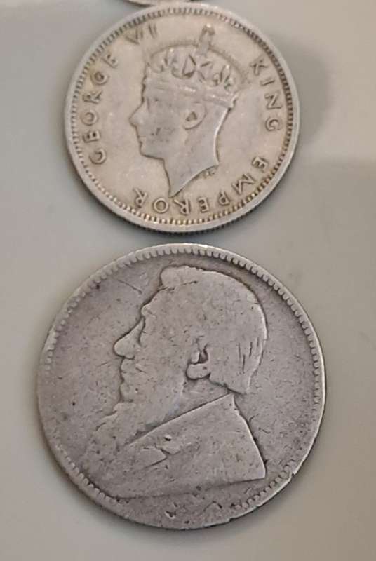 Siver coins x 6. Please see photo report.