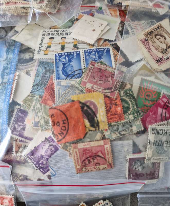 Over 50 British Colonial semi sorted stamp packs including 15 packs containing Queen Victoria stamps