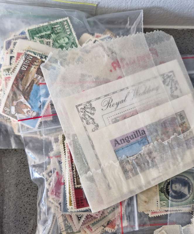 Over 50 British Colonial semi sorted stamp packs including 15 packs containing Queen Victoria stamps