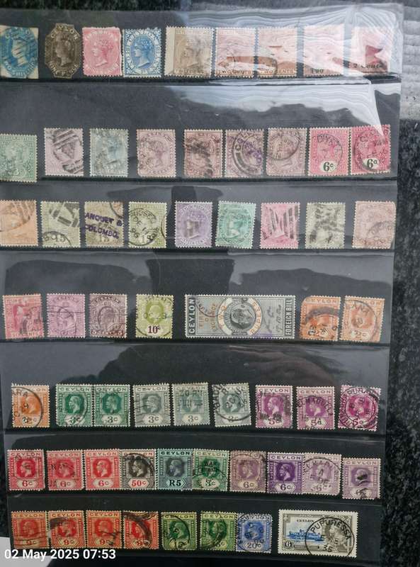 Lot of 7 sheets and 1 strip Ceylon stamps 1800s and 1900s