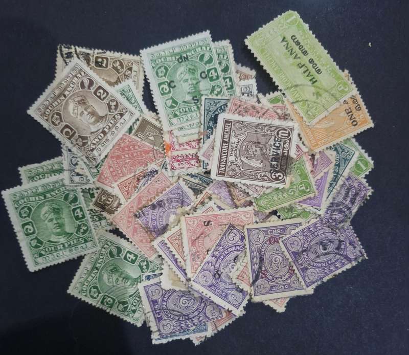 Packet of stamps from India including Queen Victoria, 3 British Kings, Service & official stamps etc