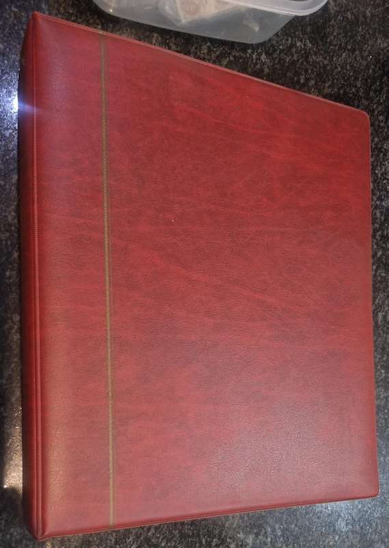 Stamp album with approx. 60 pages of worldwide stamps from 1800s to more current.