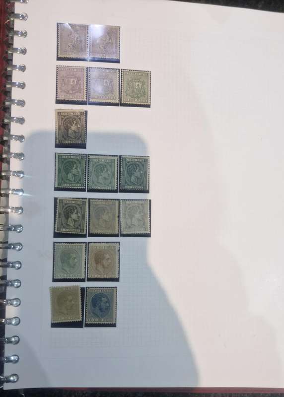 Stamp album with approx. 60 pages of worldwide stamps from 1800s to more current.