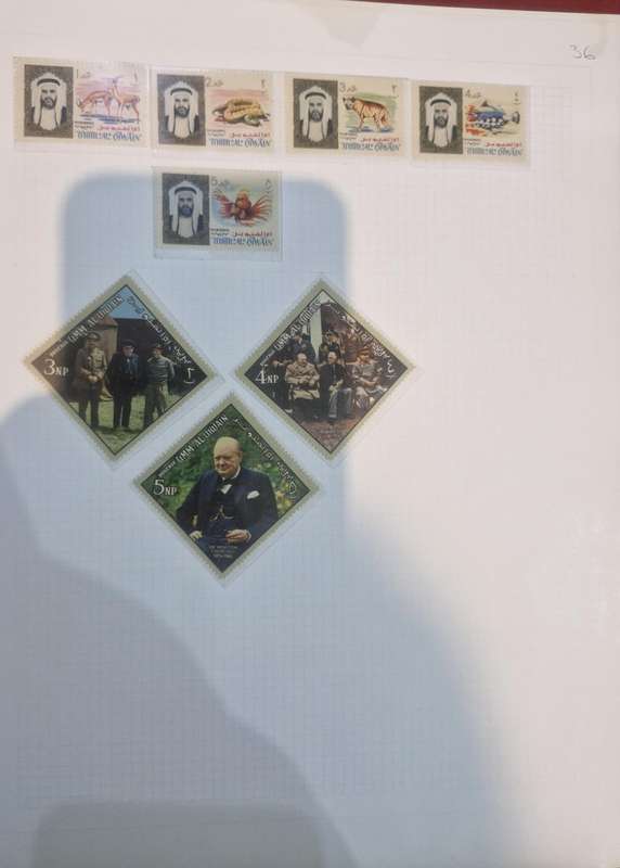 Stamp album with approx. 60 pages of worldwide stamps from 1800s to more current.