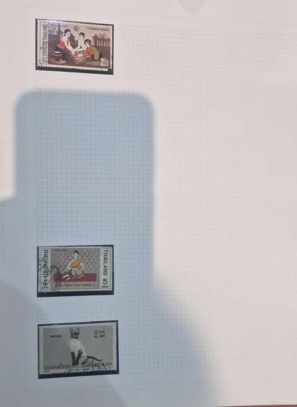 Stamp album with approx. 60 pages of worldwide stamps from 1800s to more current.