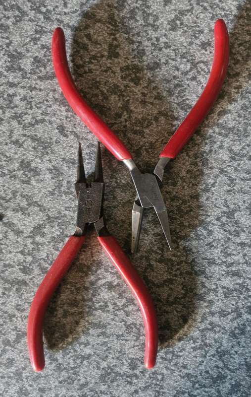 2 pairs of Jewellers pliers - 1 x round nose and 1 x round and flat nose.