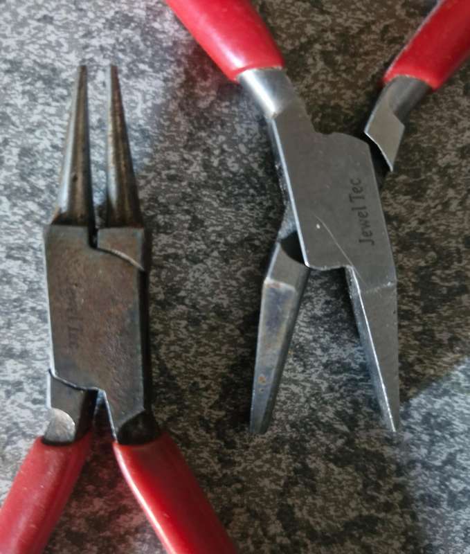 2 pairs of Jewellers pliers - 1 x round nose and 1 x round and flat nose.