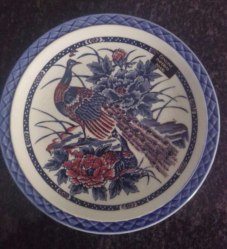 Set of 4 oriental plates/bowls, all with makers marks/label.
