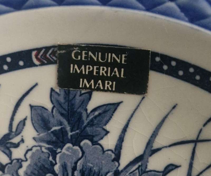 Set of 4 oriental plates/bowls, all with makers marks/label.