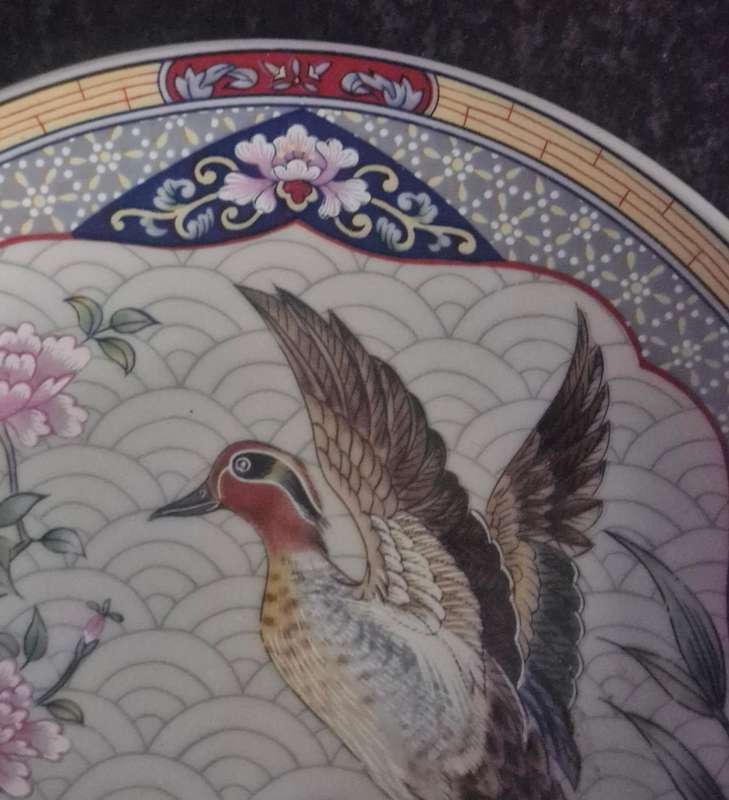 Set of 4 oriental plates/bowls, all with makers marks/label.
