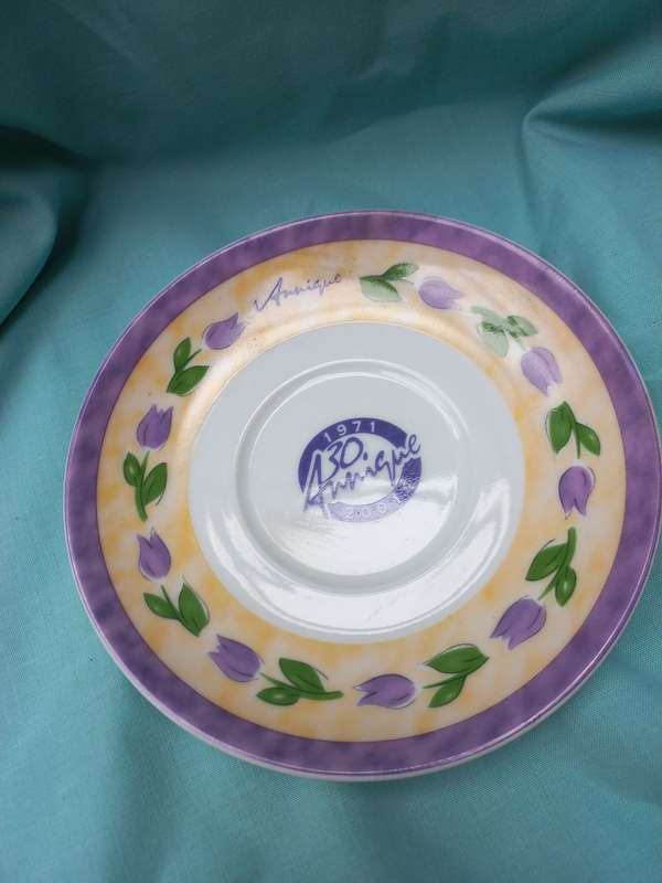 Porcelain teapot andcup and sauser