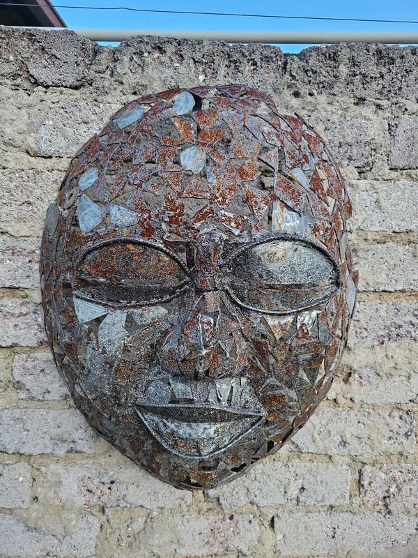 Metal Mask Sculpture