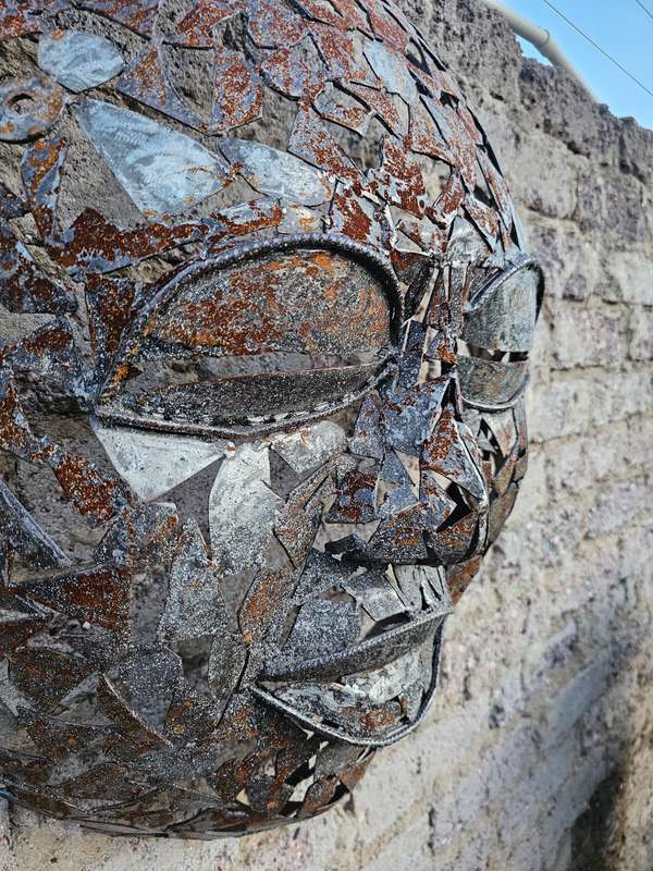 Metal Mask Sculpture