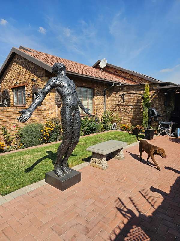 Faith Man Sculpture