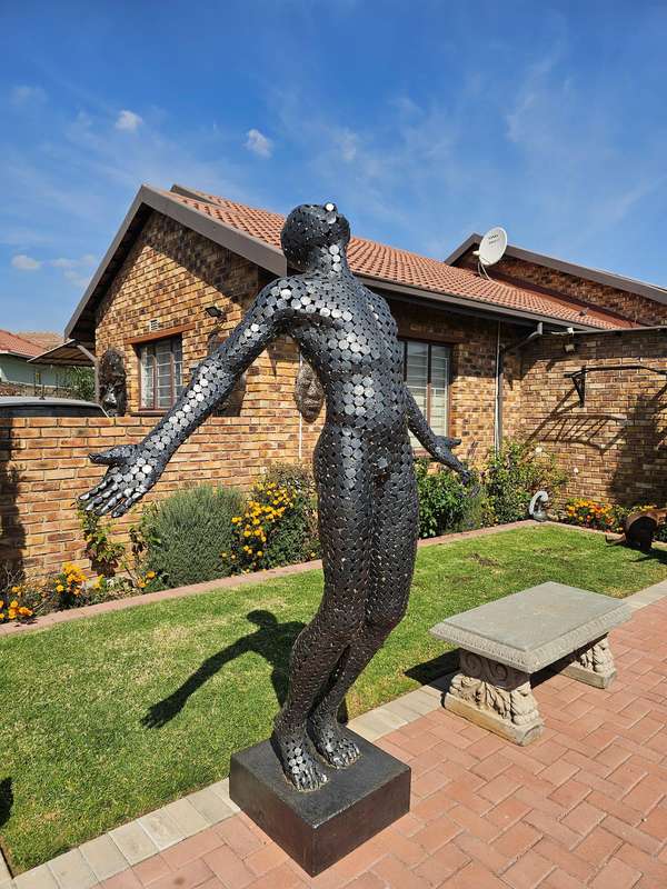 Faith Man Sculpture
