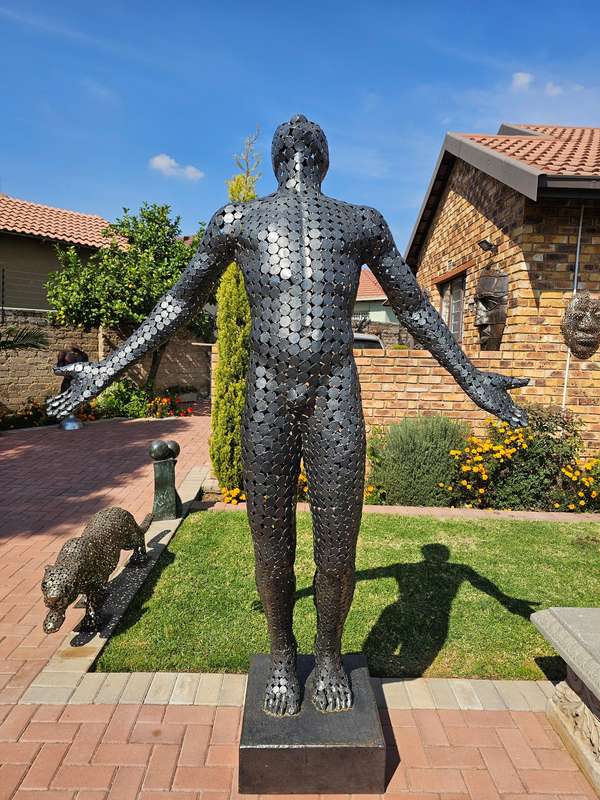 Faith Man Sculpture