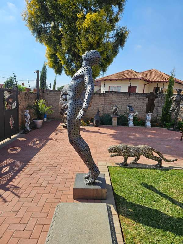 Faith Man Sculpture