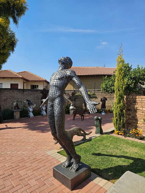 Faith Man Sculpture