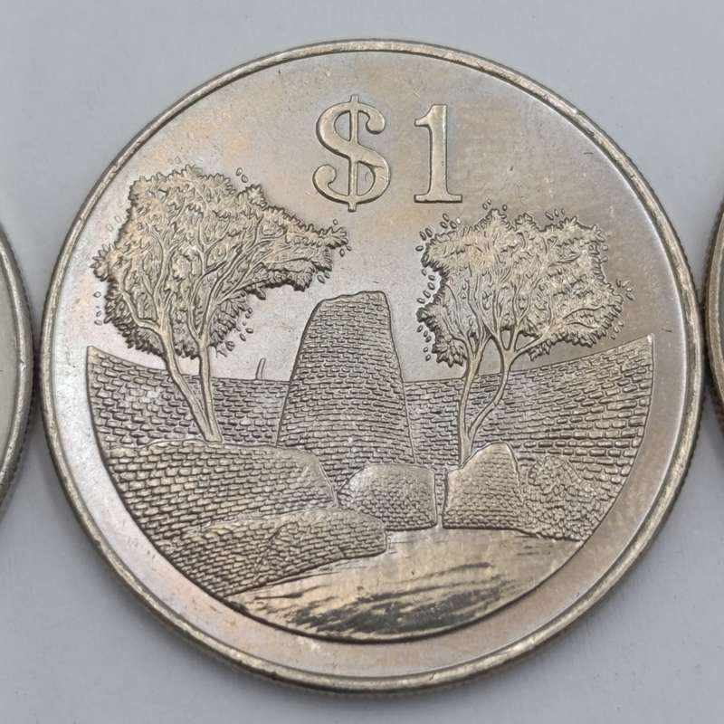 Zimbabwe set of 4 $ coins 1980, 1993, 1997 & 2001