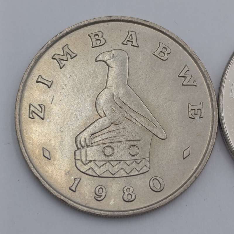 Zimbabwe set of 4 $ coins 1980, 1993, 1997 & 2001