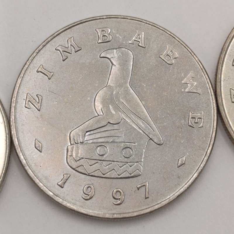 Zimbabwe set of 4 $ coins 1980, 1993, 1997 & 2001