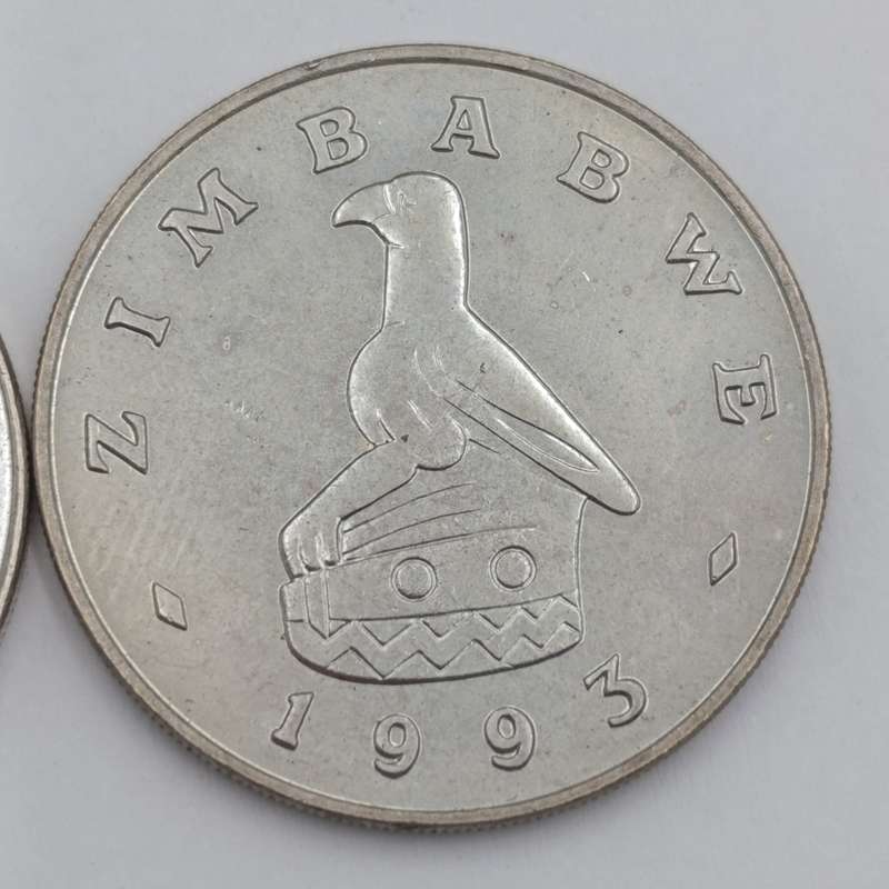 Zimbabwe set of 4 $ coins 1980, 1993, 1997 & 2001