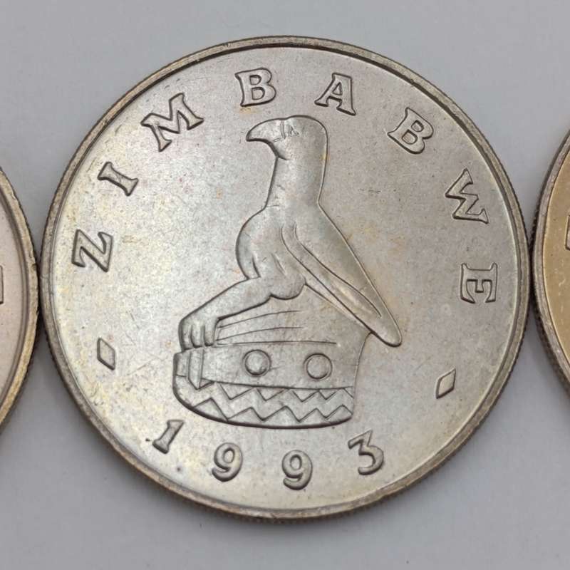 Zimbabwe set of 4 x $ coins 1980, 1993, 1997 & 2001