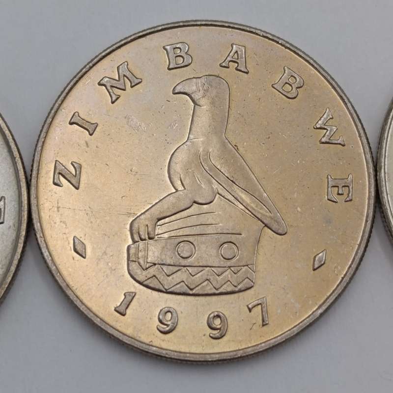 Zimbabwe set of 4 x $ coins 1980, 1993, 1997 & 2001