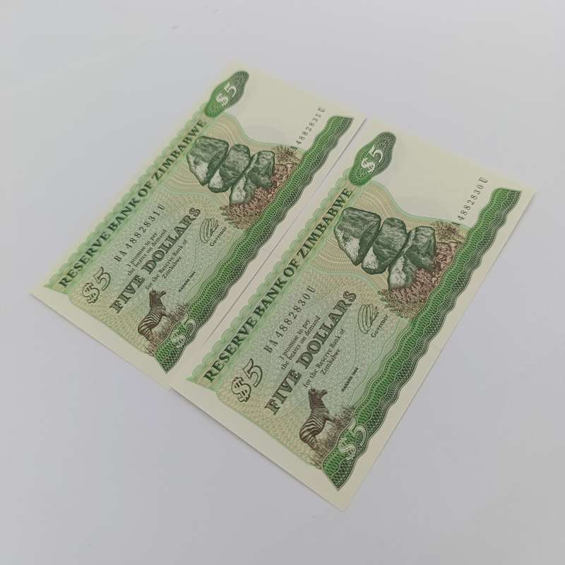 Zimbabwe 1994 pair of $5 banknotes uncirculated with consecutive numbers - short neck bird watermark