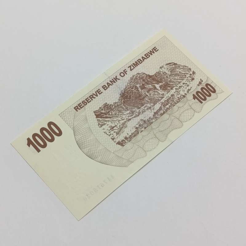Zimbabwe $1000 bearer cheques issued 1 Aug 2006 lot of 3 uncirculated notes with consecutive numbers