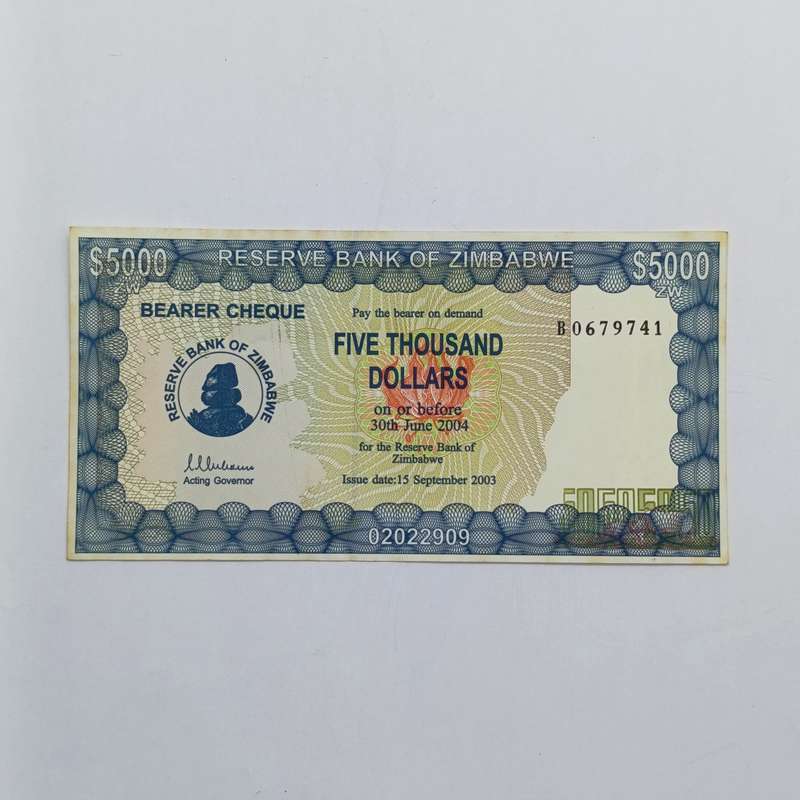 Zimbabwe $5000 Bearer cheque issued 15 Sept 2003 uncirculated with paper clip dent B number