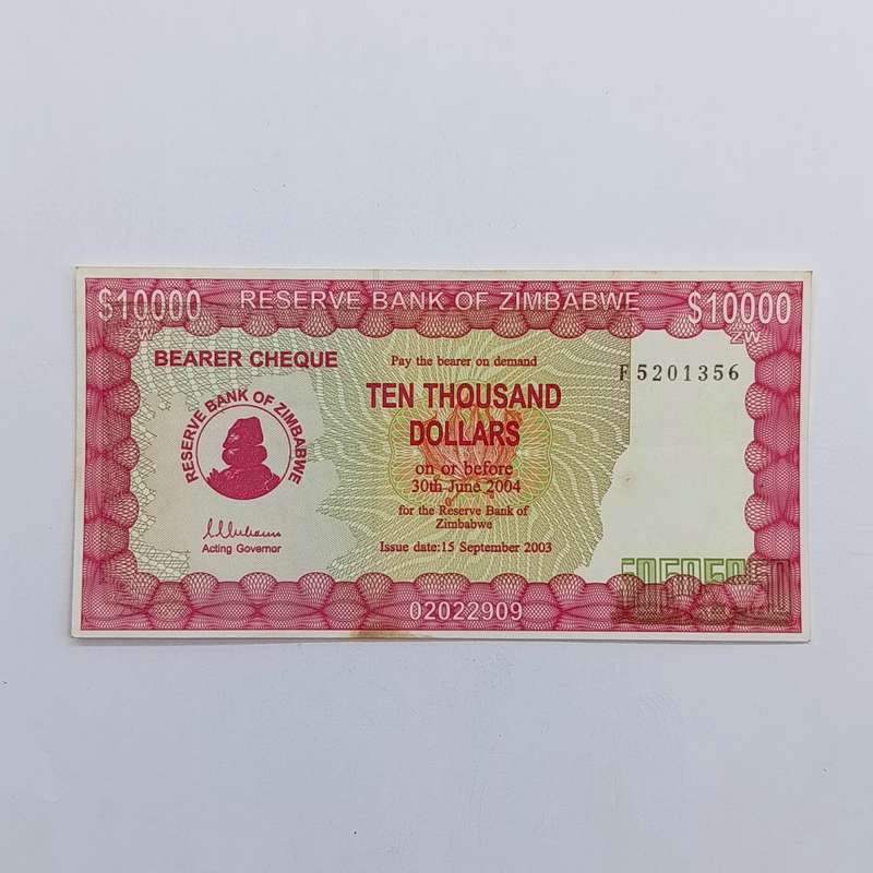 Zimbabwe $10 000 issued 15 September 2003 Bearer cheque - some discoloring but unused