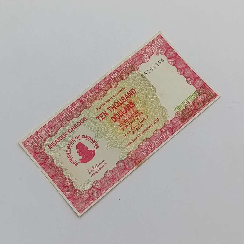 Zimbabwe $10 000 issued 15 September 2003 Bearer cheque - some discoloring but unused