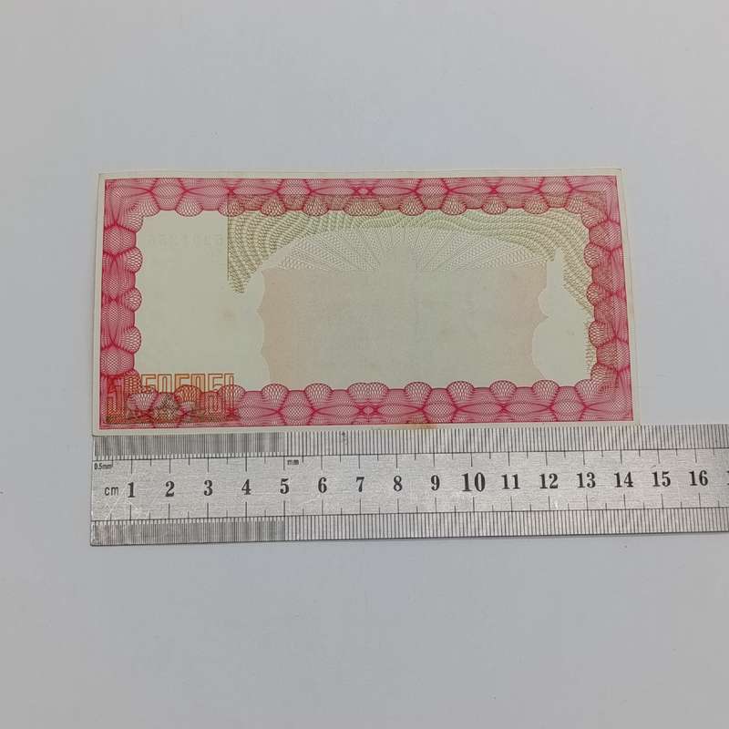 Zimbabwe $10 000 issued 15 September 2003 Bearer cheque - some discoloring but unused