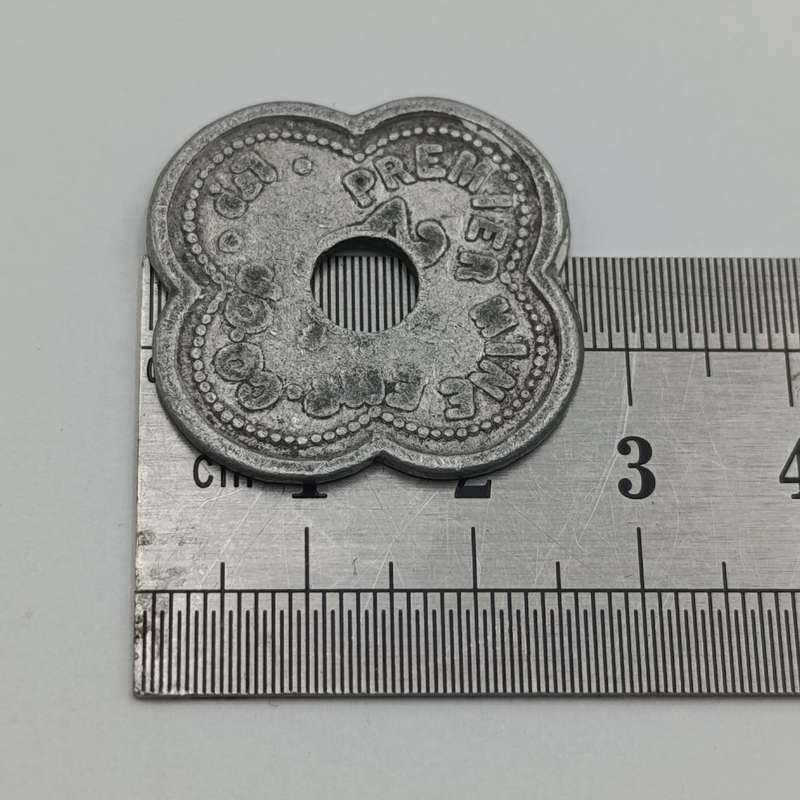 20 Shilling Premier Mine token with O punched out to make 2shilling