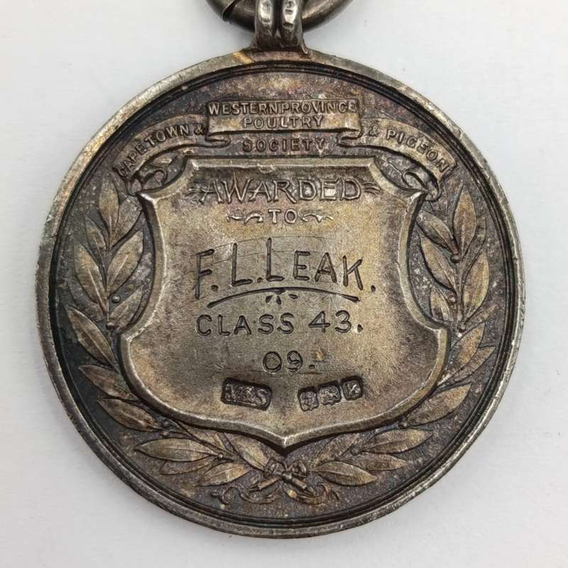 1909 Western Province Poultry medal awarded to FL Leak - Sterling silver