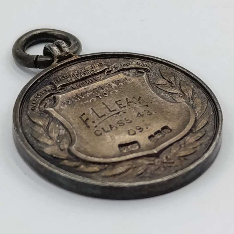 1909 Western Province Poultry medal awarded to FL Leak - Sterling silver
