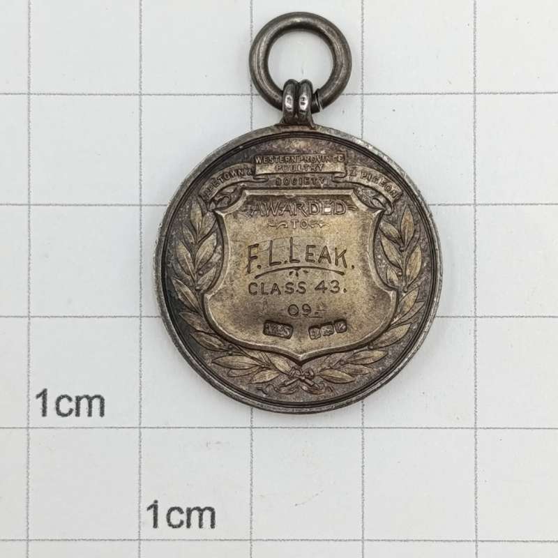 1909 Western Province Poultry medal awarded to FL Leak - Sterling silver