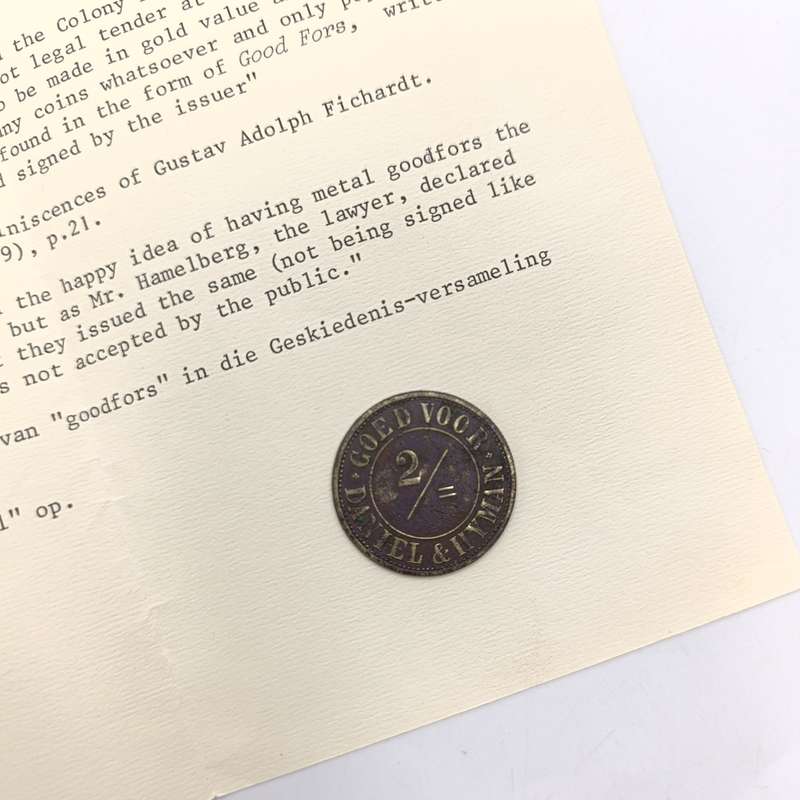 Daniel and Hyman Goed Voor 2 Shilling token with letter from National Museum