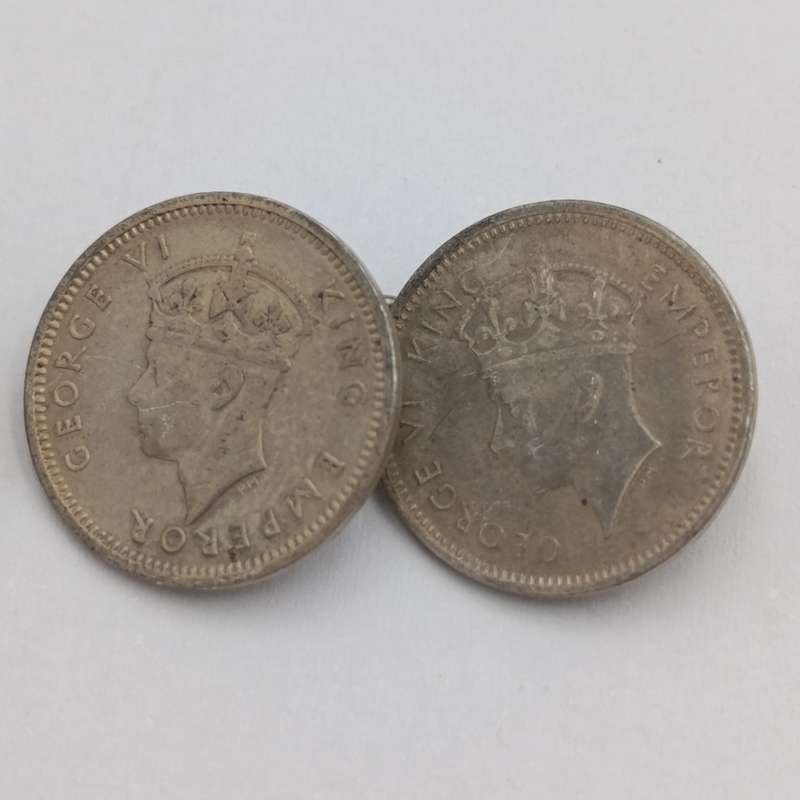 Pair of Rhodesia silver tickeys cufflinks