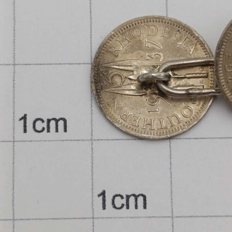 Pair of Rhodesia silver tickeys cufflinks