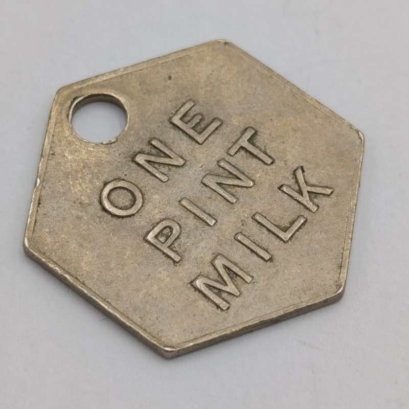 Model Dairy East London One pint hexagon milk token