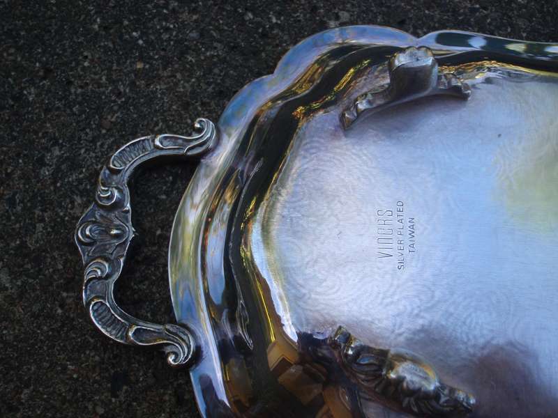 Gorgeous  silverplated tray, lovelt patterns, handles and feet. Wonderful for displaying items.