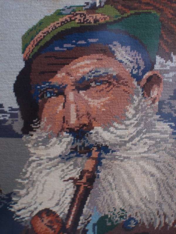 The best tapestry I have ever seen. Wonderful image of a bearded man in full regalia. Ornate frame